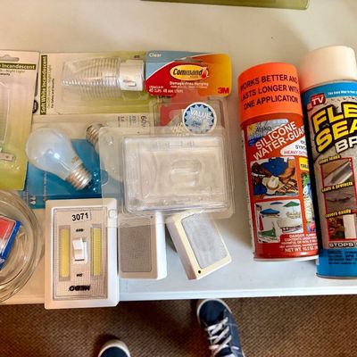 Sale Photo Thumbnail #383: Lot contains many useful household items including light bulbs, nightlights, cans of sealants, etc.