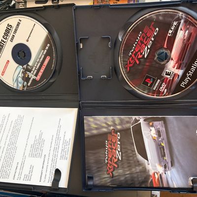 Sale Photo Thumbnail #327: Lot of 4 PS2 games in cases.
