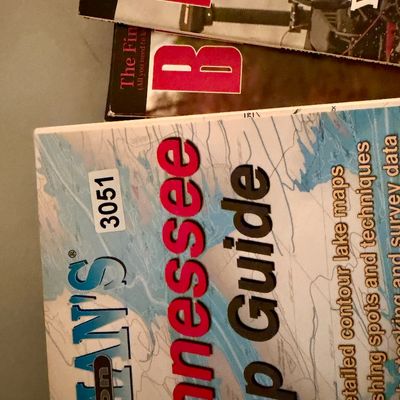 Sale Photo Thumbnail #430: Lot of many fishing books, maps and magazines. Good condition.