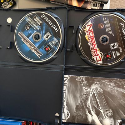 Sale Photo Thumbnail #335: Lot of 4 PS2 games in original cases.