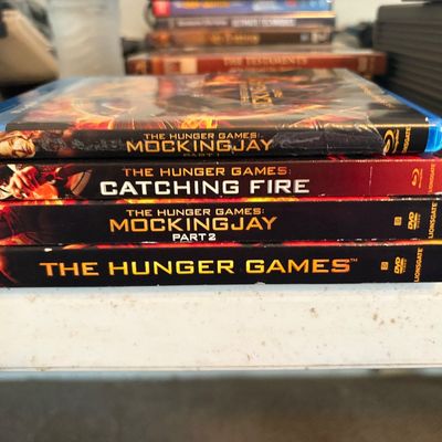 Sale Photo Thumbnail #348: Lot of 4 Blu-ray, DVD The Hunger Games movies.