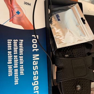 Sale Photo Thumbnail #317: New and unused foot massager featuring pads, instruction manual and all accessories in original box.