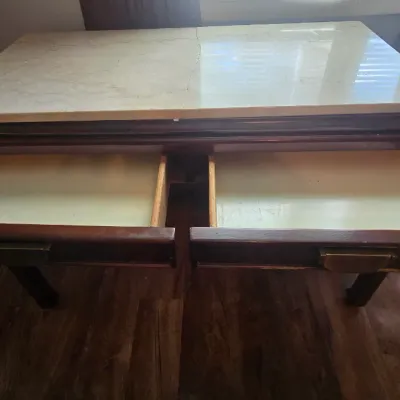 Sale Photo Thumbnail #30: This desk constricted with solid wood.  Marble top is broke into two pieces and is not fastened to the desk.
Selling as is