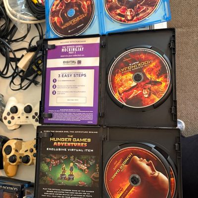 Sale Photo Thumbnail #349: Lot of 4 Blu-ray, DVD The Hunger Games movies.