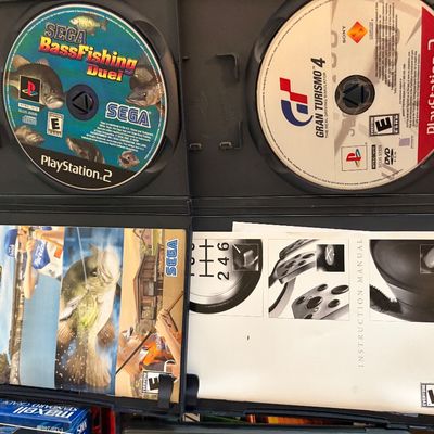 Sale Photo Thumbnail #331: Lot of 4 PS2 games all in original cases.