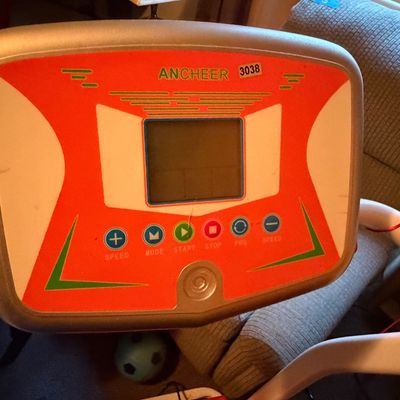 Sale Photo Thumbnail #285: Electric treadmill in good working order. Orange and white in color.