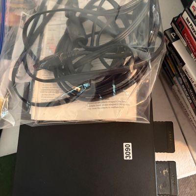 Sale Photo Thumbnail #324: PS2 Console complete with power cords and owners manual.