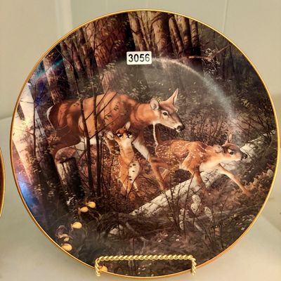 Sale Photo Thumbnail #423: Lot includes 3 decorative plates featuring wildlife/ landscape photos.