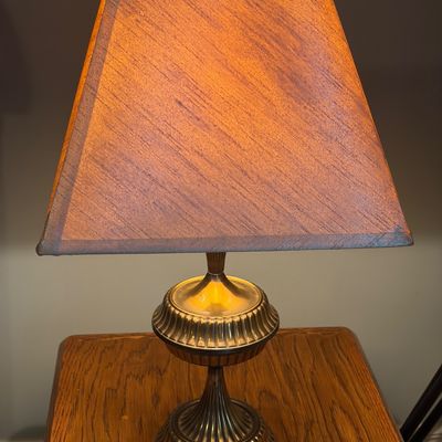 Sale Photo Thumbnail #271: Set of 2 brass lamps. Off white lamp shades. Both in good working order.