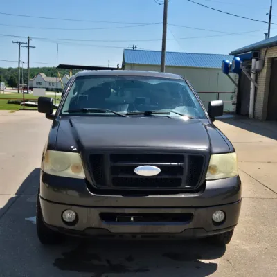 Sale Photo Thumbnail #3: 131,521 miles 
4 Door
Manual Windows and locks
Cruise
Tonneau cover
Bedliner
Newer tires with lots of tread

Check Engine light and brake lights are on.  Runs and drives well.