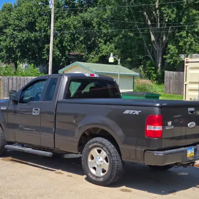 Sale Photo Thumbnail #5: 131,521 miles 
4 Door
Manual Windows and locks
Cruise
Tonneau cover
Bedliner
Newer tires with lots of tread

Check Engine light and brake lights are on.  Runs and drives well.
