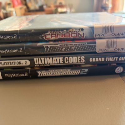 Sale Photo Thumbnail #334: Lot of 4 PS2 games in original cases.
