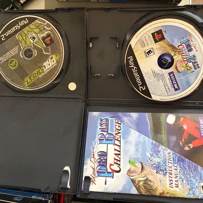 Sale Photo Thumbnail #332: Lot of 4 PS2 games all in original cases.