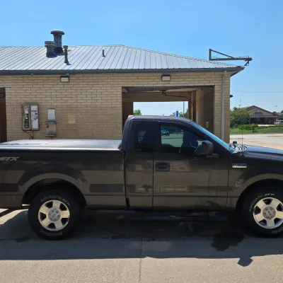 Sale Photo Thumbnail #2: 131,521 miles 
4 Door
Manual Windows and locks
Cruise
Tonneau cover
Bedliner
Newer tires with lots of tread

Check Engine light and brake lights are on.  Runs and drives well.