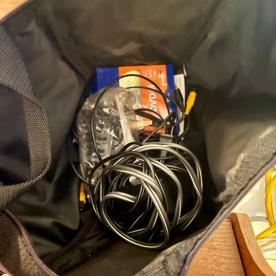 Sale Photo Thumbnail #305: This lot includes a Sony Handycam, tapes, cords, manual and the original carrying case along with a bag of accessories. In good working condition.