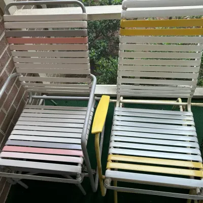 2 Mid-Century Vinyl Strap Glider Chairs