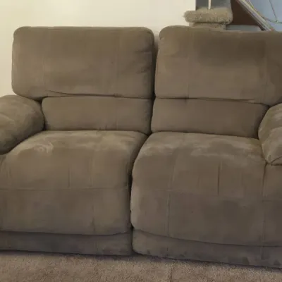 Brown reclining sofa