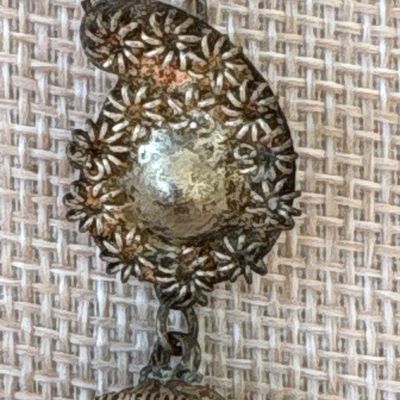 Sale Photo Thumbnail #399: Probably silver, but no markings. 6.6 grams