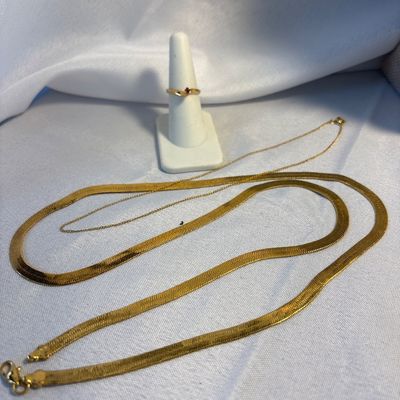 Sale Photo Thumbnail #187: Ring is size 7 and marked 18KT HGE. 15” chain marked 12K G.F.  No markings on 24” herringbone necklace. See pictures
