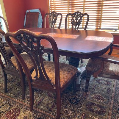 Sale Photo Thumbnail #10: Mahogany table and chairs
Also includes 2 leafs
Stunning table with 8 chairs
2 captains & 6 regular chairs
