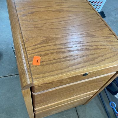 Sale Photo Thumbnail #536: Wood filing cabinet