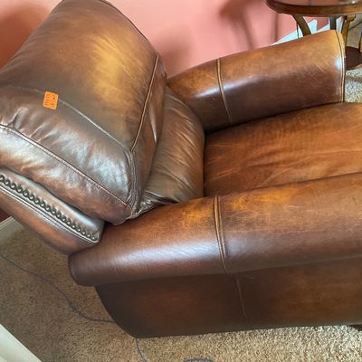 Sale Photo Thumbnail #105: Pair of reclining leather chairs with matching singular ottoman