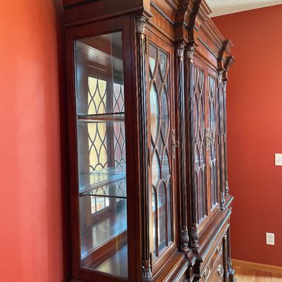 Sale Photo Thumbnail #20: Solid mahogany china cabinet with touch light inside
Stunning piece 
Too part can be taken off for easier transport