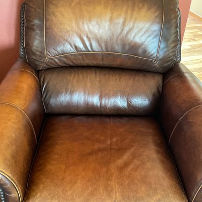 Sale Photo Thumbnail #108: Pair of reclining leather chairs with matching singular ottoman