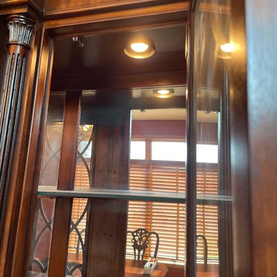 Sale Photo Thumbnail #15: Solid mahogany china cabinet with touch light inside
Stunning piece 
Too part can be taken off for easier transport