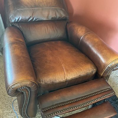 Sale Photo Thumbnail #107: Pair of reclining leather chairs with matching singular ottoman