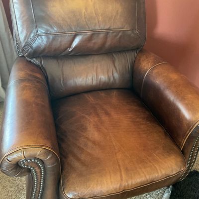 Sale Photo Thumbnail #104: Pair of reclining leather chairs with matching singular ottoman