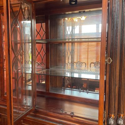 Sale Photo Thumbnail #19: Solid mahogany china cabinet with touch light inside
Stunning piece 
Too part can be taken off for easier transport