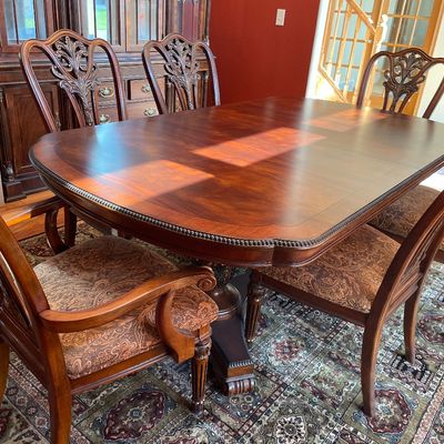 Sale Photo Thumbnail #6: Mahogany table and chairs
Also includes 2 leafs
Stunning table with 8 chairs
2 captains & 6 regular chairs