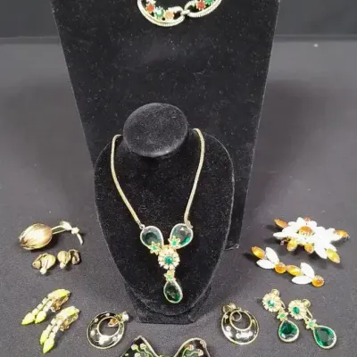Bundle Of Beautiful Costume Jewelry Wrapped Up With A Bow