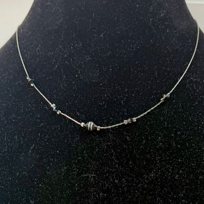 Sale Photo Thumbnail #376: In good used condition. Necklace is approx. 16" long.