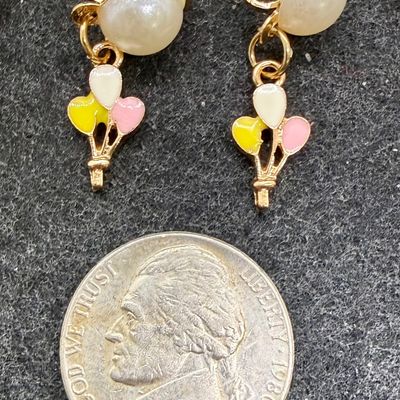 Sale Photo Thumbnail #264: 16 Pairs Assorted Clip-on Earrings featuring various playful enameled designs like animals, sweets, and flowers. Good condition.