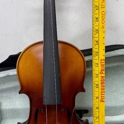 Sale Photo Thumbnail #21: Violin needs to be re-strung, but it otherwise is in near-new condition. Violin and bow both store inside the lined case. See photos for other details.