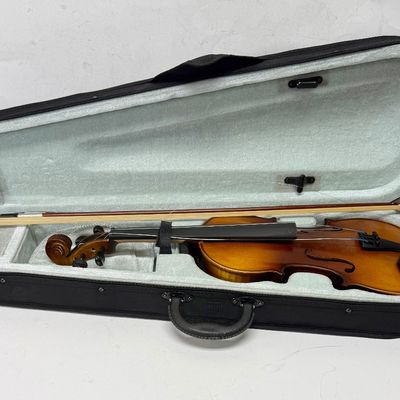 Sale Photo Thumbnail #18: Violin needs to be re-strung, but it otherwise is in near-new condition. Violin and bow both store inside the lined case. See photos for other details.