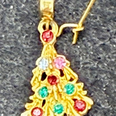 Sale Photo Thumbnail #388: For pierced ears, one earring looks to be missing 2 stones.