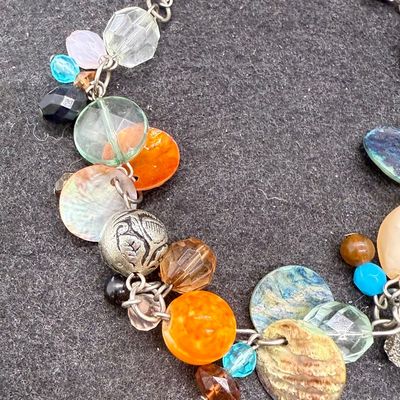 Sale Photo Thumbnail #468: Multi-colored beads and crystals. Good condition.