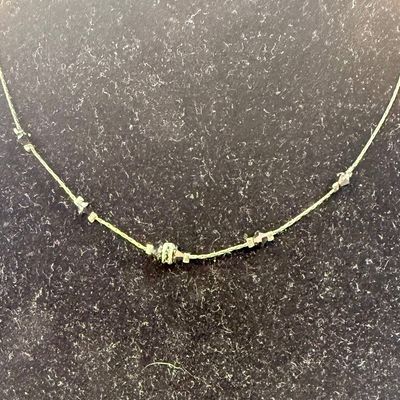 Sale Photo Thumbnail #377: In good used condition. Necklace is approx. 16" long.
