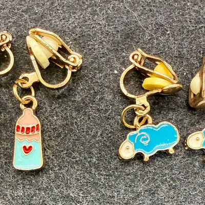 Sale Photo Thumbnail #263: 16 Pairs Assorted Clip-on Earrings featuring various playful enameled designs like animals, sweets, and flowers. Good condition.