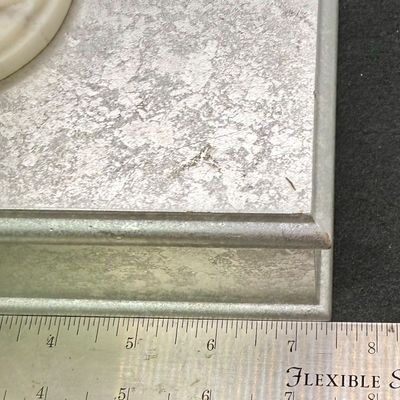 Sale Photo Thumbnail #463: Silver-colored hinged lid box for jewelry or other small items. Good condition, measures approx. 7.5” x 5.5”.