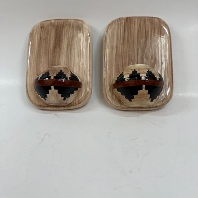Sale Photo Thumbnail #61: Pair of ceramic plaques made to look like a wood plaque with a small woven southwestern basket.  Each is about the size of a standard light switch, good condition.