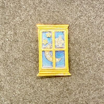 Sale Photo Thumbnail #77: Gold-tone window from with a dark blue sky, and bejeweled moon and stars. In great condition.