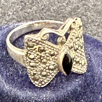 Sale Photo Thumbnail #454: Size 6.5, black stone in body of butterfly. 3.4g total weight.