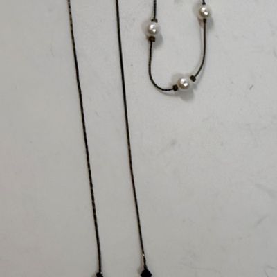 Sale Photo Thumbnail #374: In good used condition. Necklace is approx. 16" long.