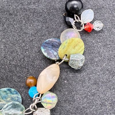Sale Photo Thumbnail #467: Multi-colored beads and crystals. Good condition.