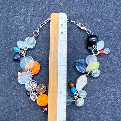 Sale Photo Thumbnail #466: Multi-colored beads and crystals. Good condition.