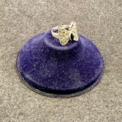 Sale Photo Thumbnail #455: Size 6.5, black stone in body of butterfly. 3.4g total weight.